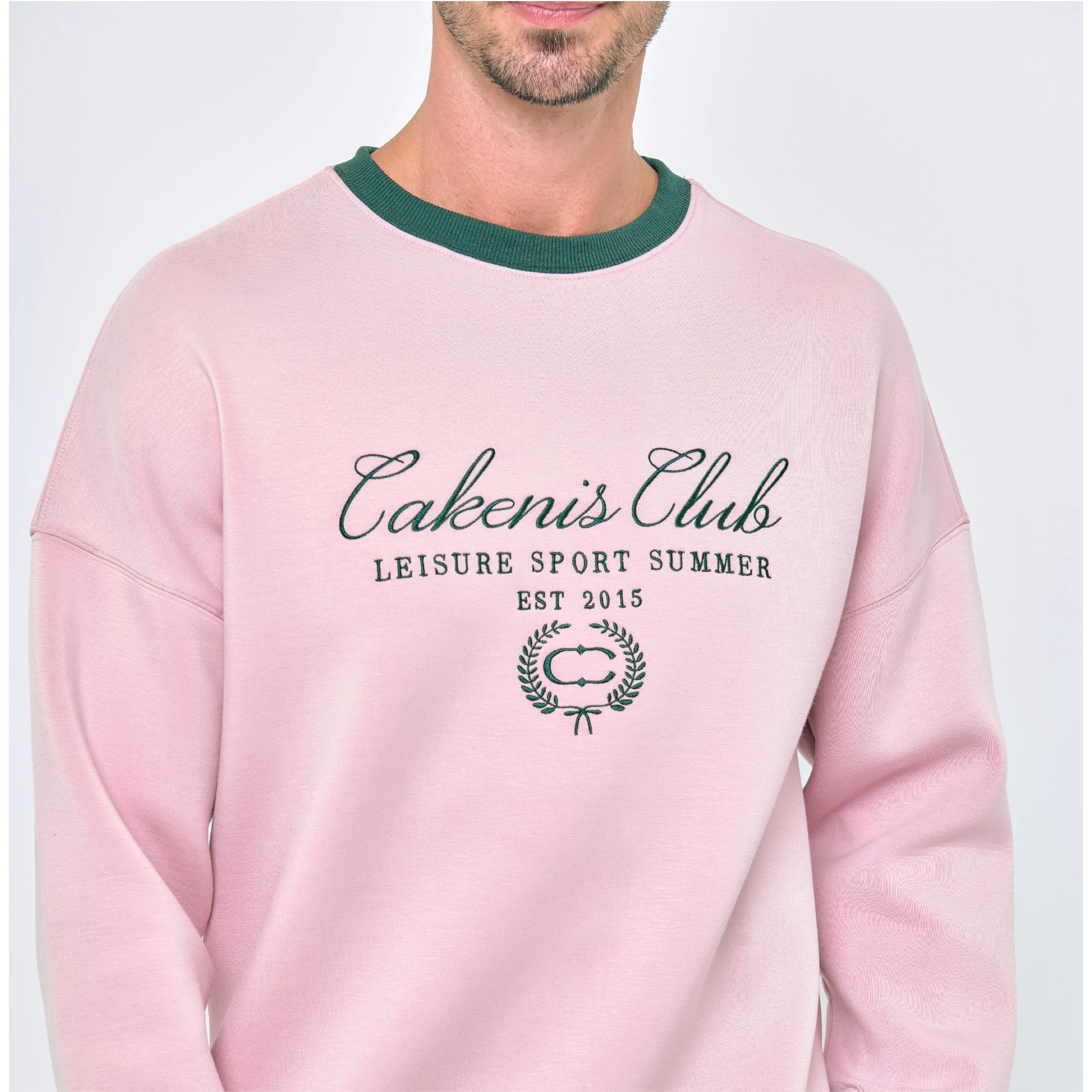 CAKENIS CLUB CLUBHOUSE UNISEX JUMPER IN LIGHT PINK