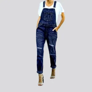 Distressed women's jeans overall