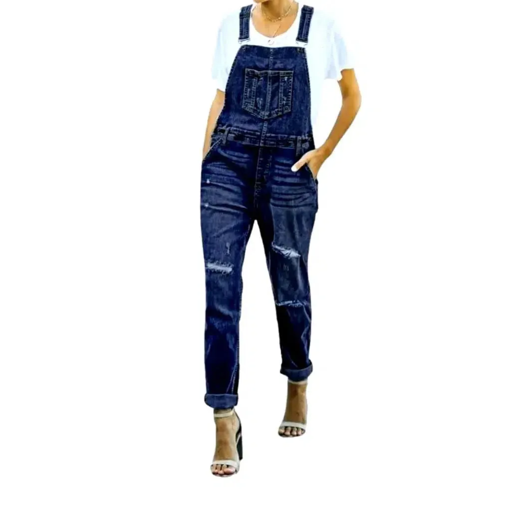 Distressed women's jeans overall