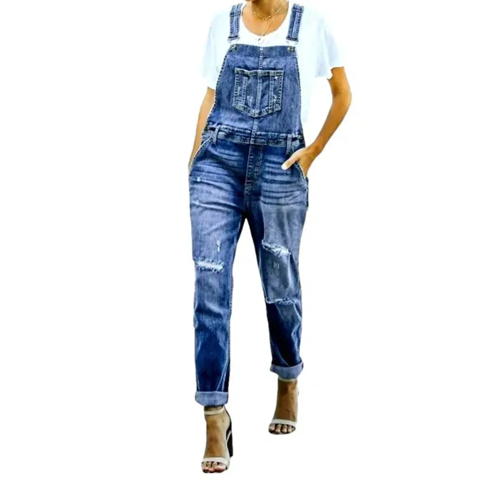 Distressed women's jeans overall